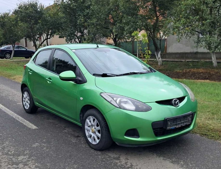 Vand mazda 2 1,3 benzina an 2010