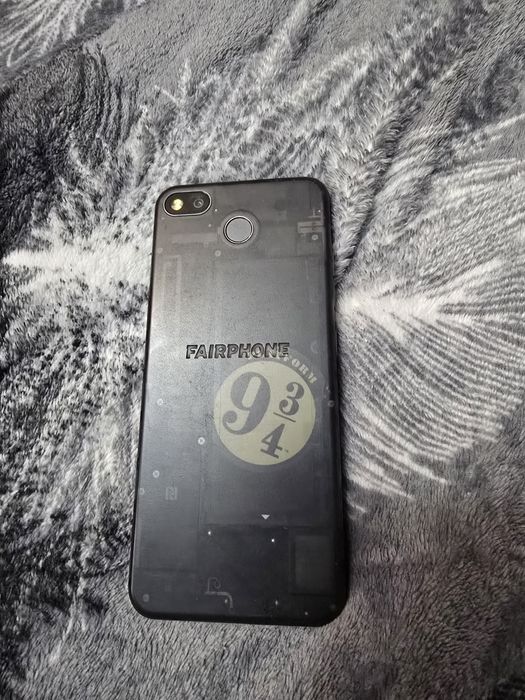 Telefon fairphone pin uitat
