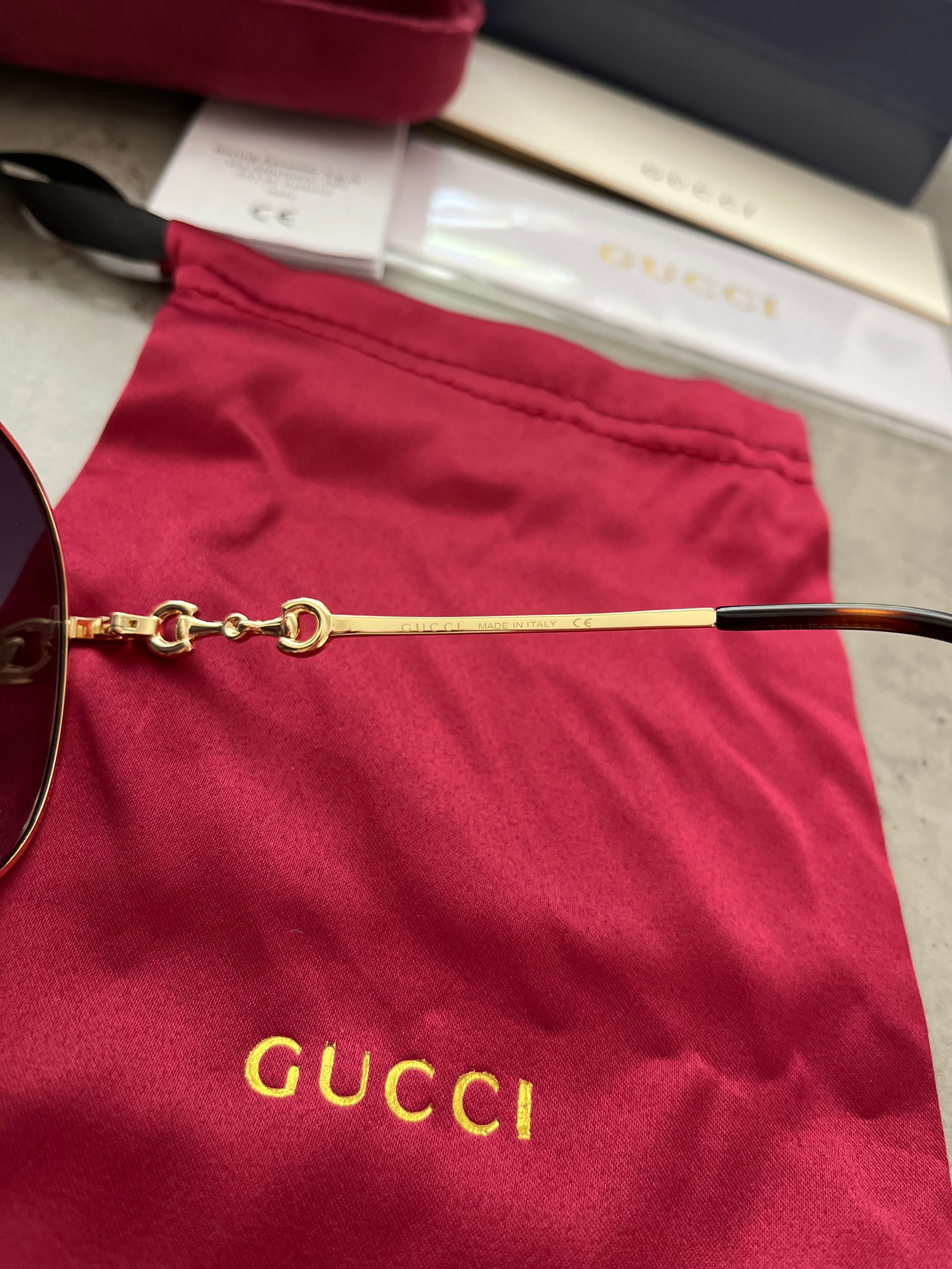 Кръгли слънчеви очила Gucci