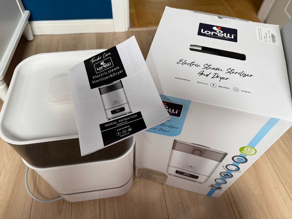 Продавам електрически парен стерилизатор със сушилня Lorelli