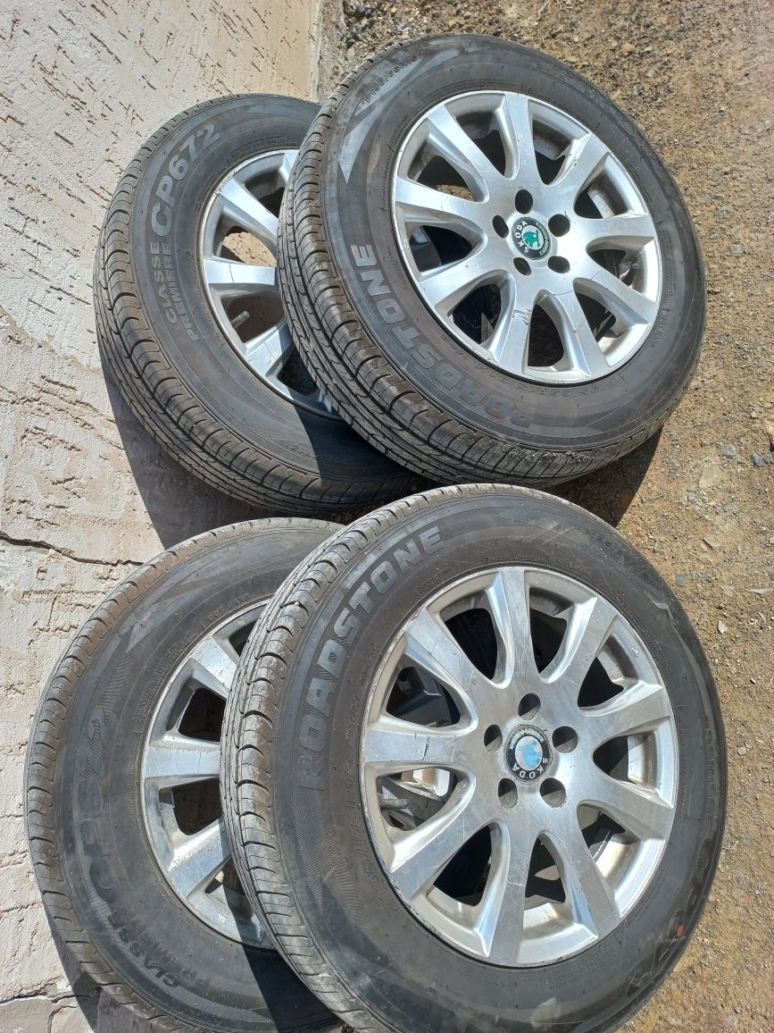 Продам диски с новыми шынами. 5×100