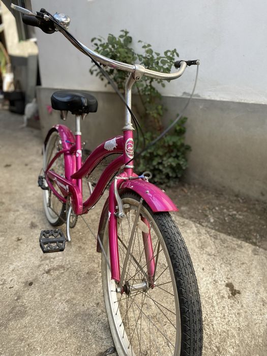 Bicicleta roz de vanzare