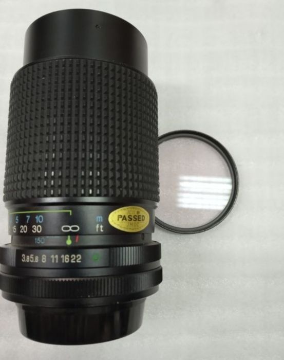 Obiectiv foto.Tokina RMC 75 150mm.       ceas
Tokina rmc 75-150mm. 1:3