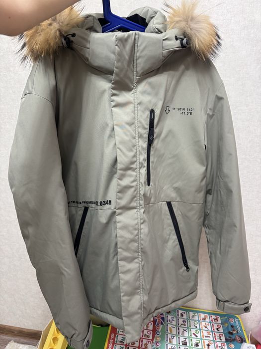 Продам зимний пуховик
