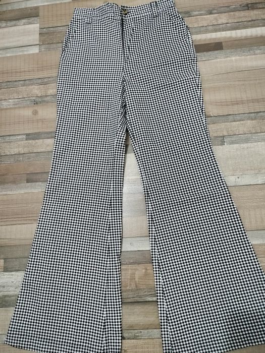 Pantaloni evazați damă