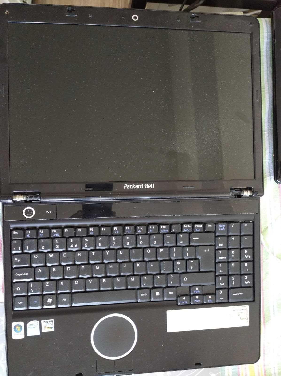 Laptop defect Packard bell cu incarcator si baterie