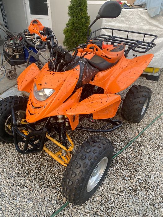 Vând atv shineray
