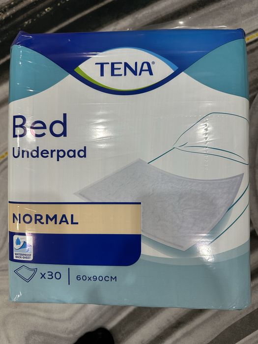 Пеленки одноразовые Tena