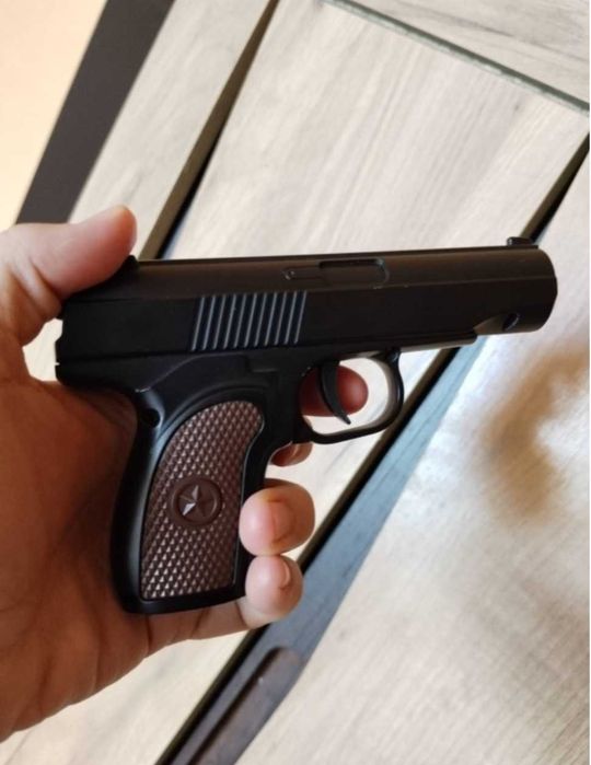 Игрушечный пневматический пистолет