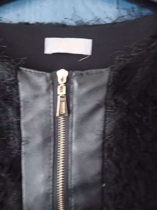 Scurtă elegantă de damă