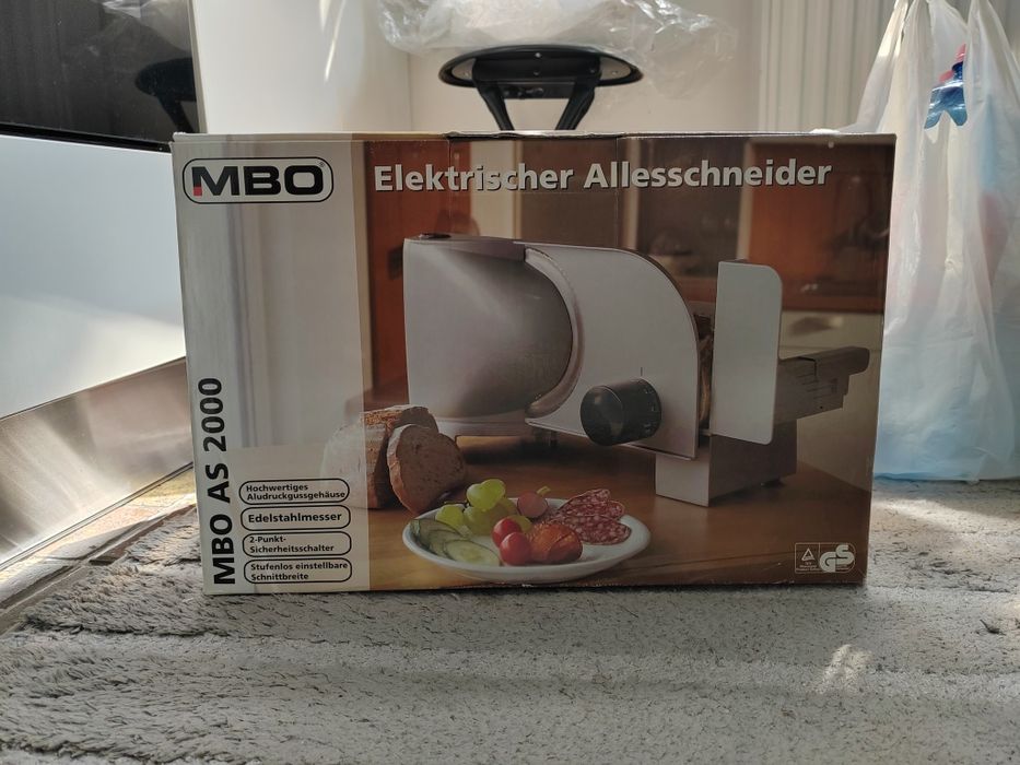 Vând feliator electric