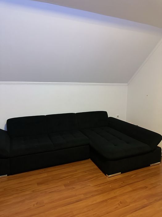 Canapea ca nouă, albastru inchis.