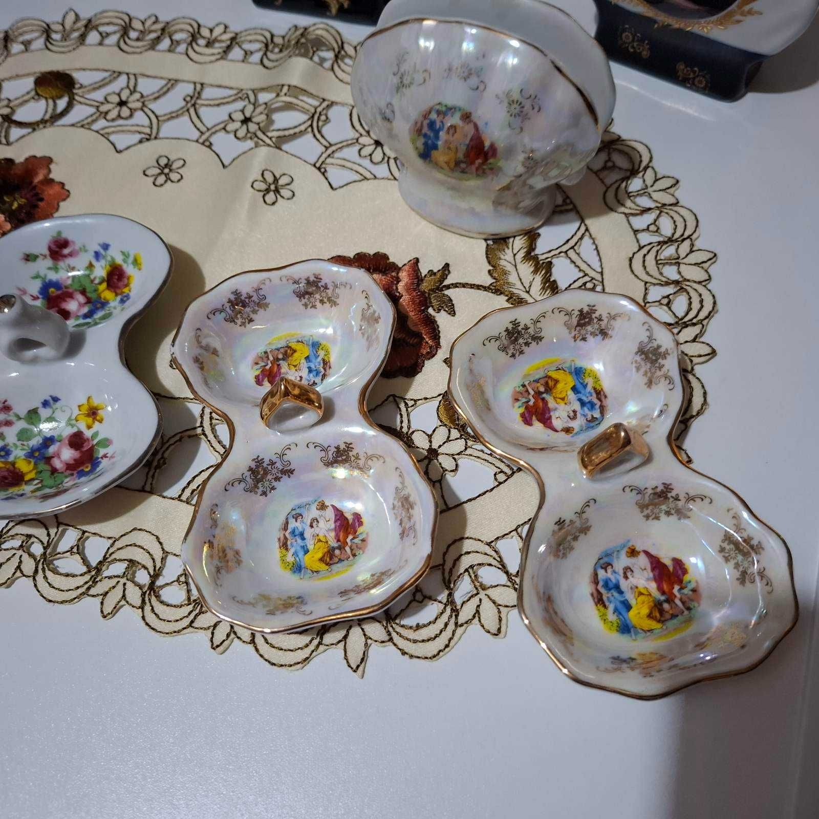 Различни модели порцеланови солници, салфетници и пепелници