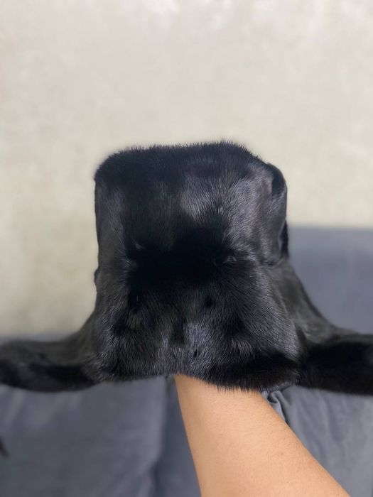 Продам норкавую шапку ушанку алмазно чёрного цвета в отличном состояни