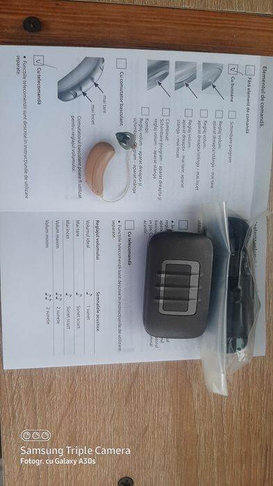 Aparat auditiv Hansaton 7HD cu reglaje.