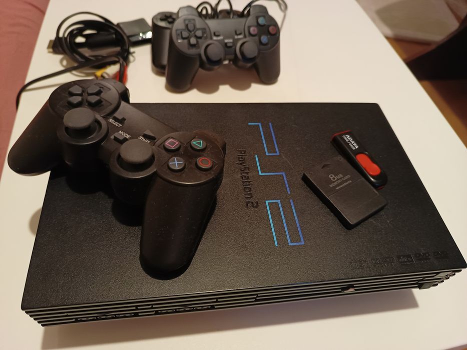 Playstation 2 хакнат с флашка с игри 64гб за ps2 ,игри mega , NES , SN