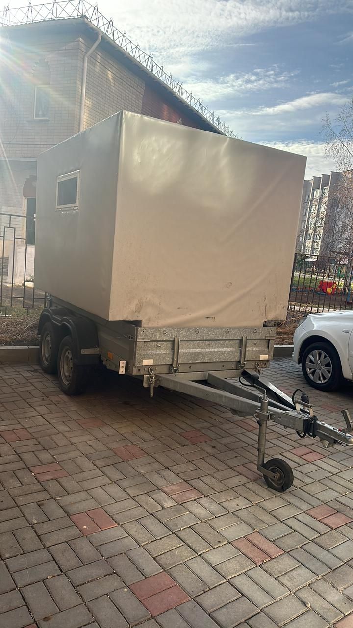 Продам прицеп новый  домиком