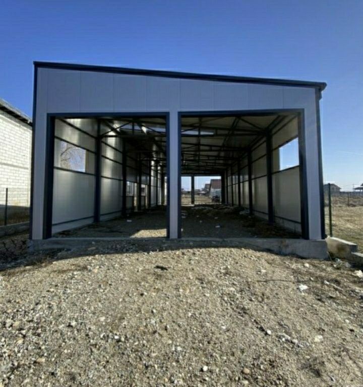 Vand hala pe structura metalica și anvelita cu panouri 32×12×4