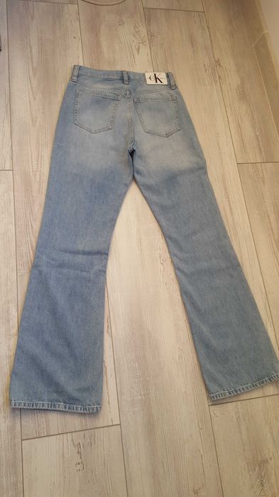 Светло сини дънки Calvin Klein Jeans за момиче с р-р W27 = S