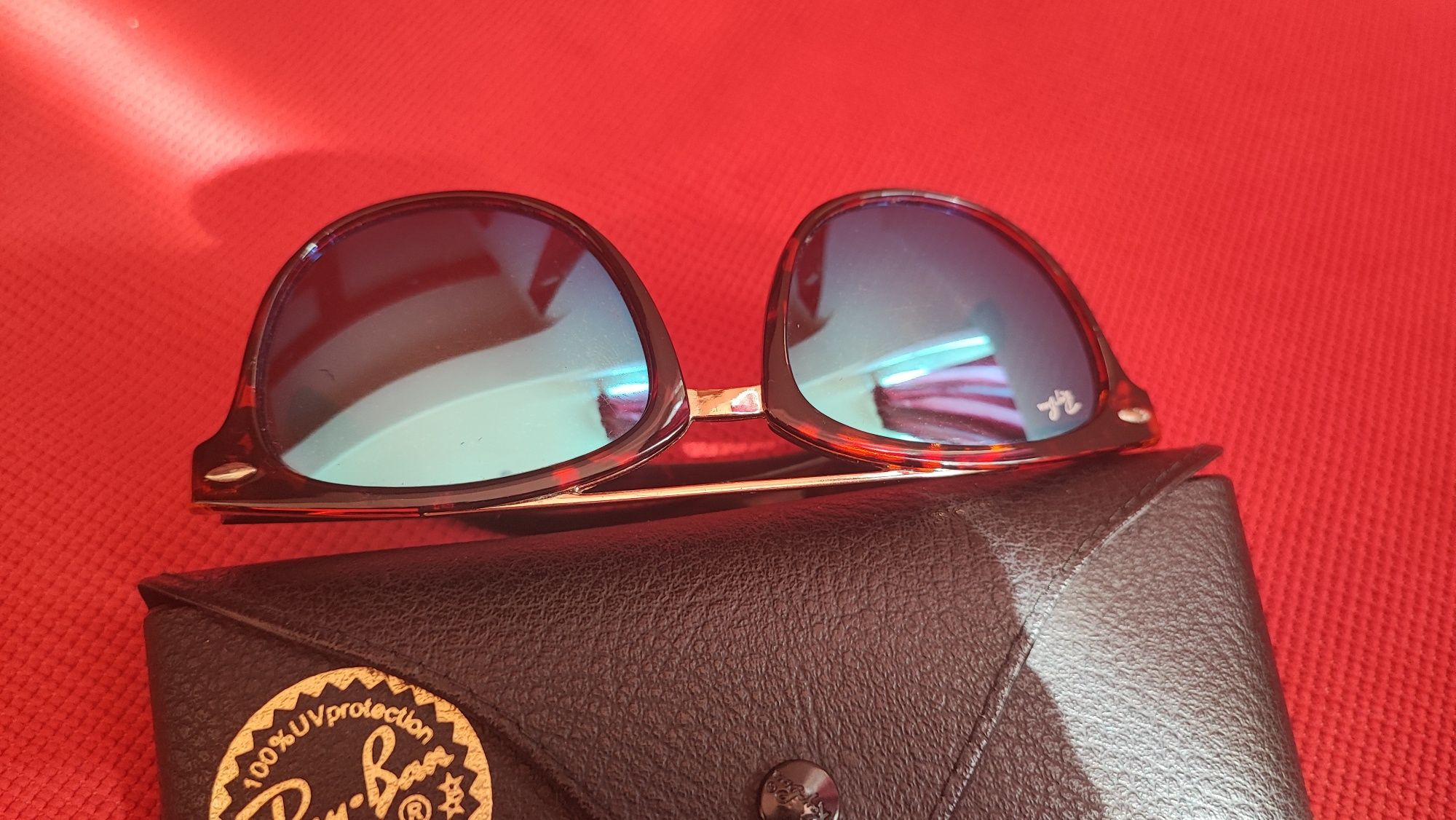 Ochelari de soare Prada, Ray Ban, Vuarnet