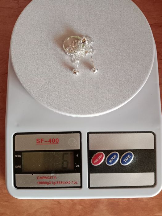 Продам серебряный комплект цепочка, кулон,серьги,кольцо 925 проба.