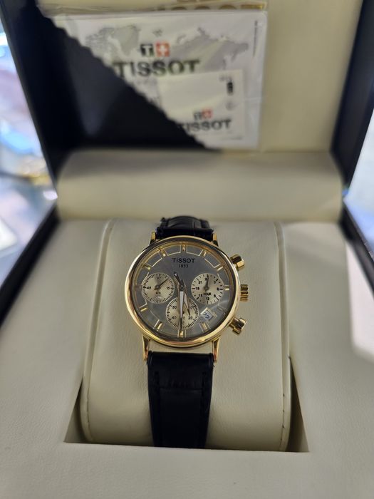 Женские золотые часы Tissot 750 пробы.