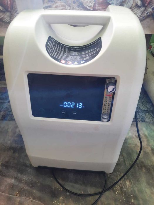 Vând concetrator oxigen