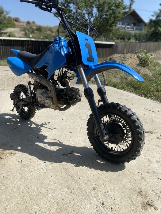 Cross 125cc in 4 timpi