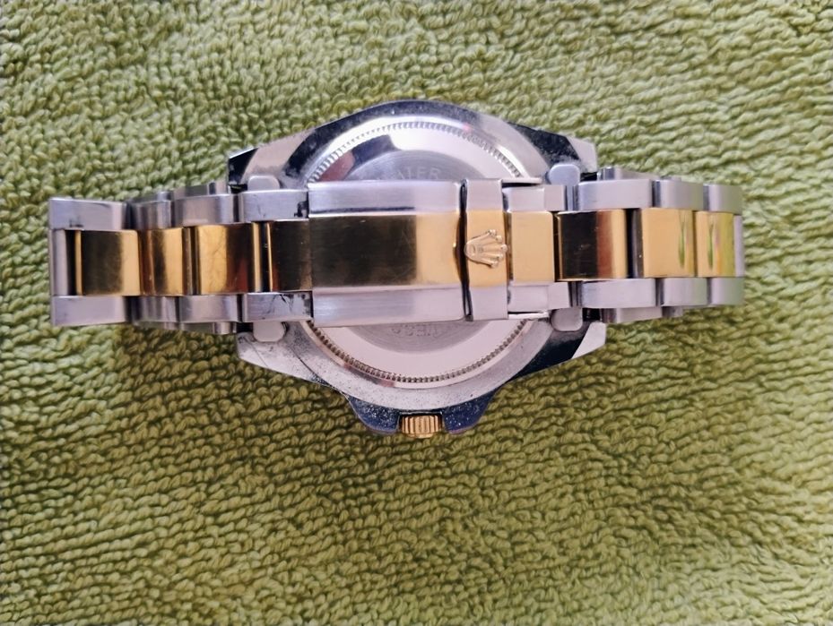 Ролекс м. часовник и м.гривна Версаче