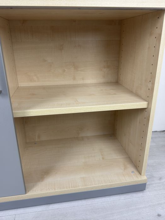 Практичен немски шкаф с плъзгащи се врати подходящ за документи;