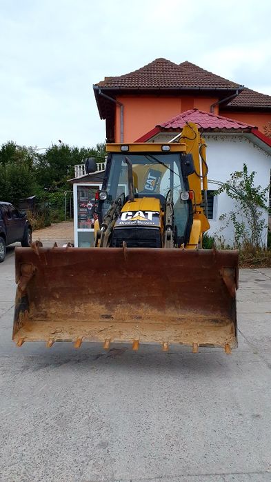 Buldoexcavator Caterpillar