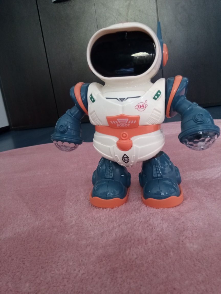 Robot interactiv, merge si danseaza, Lumini LED, sunete,melodii, 20 cm