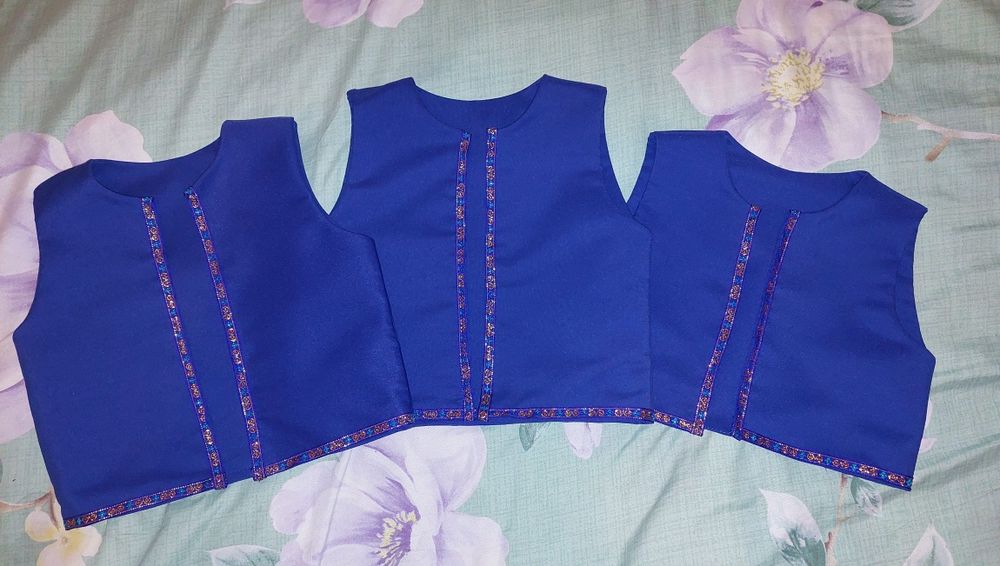 Детские жилетки. Новые.