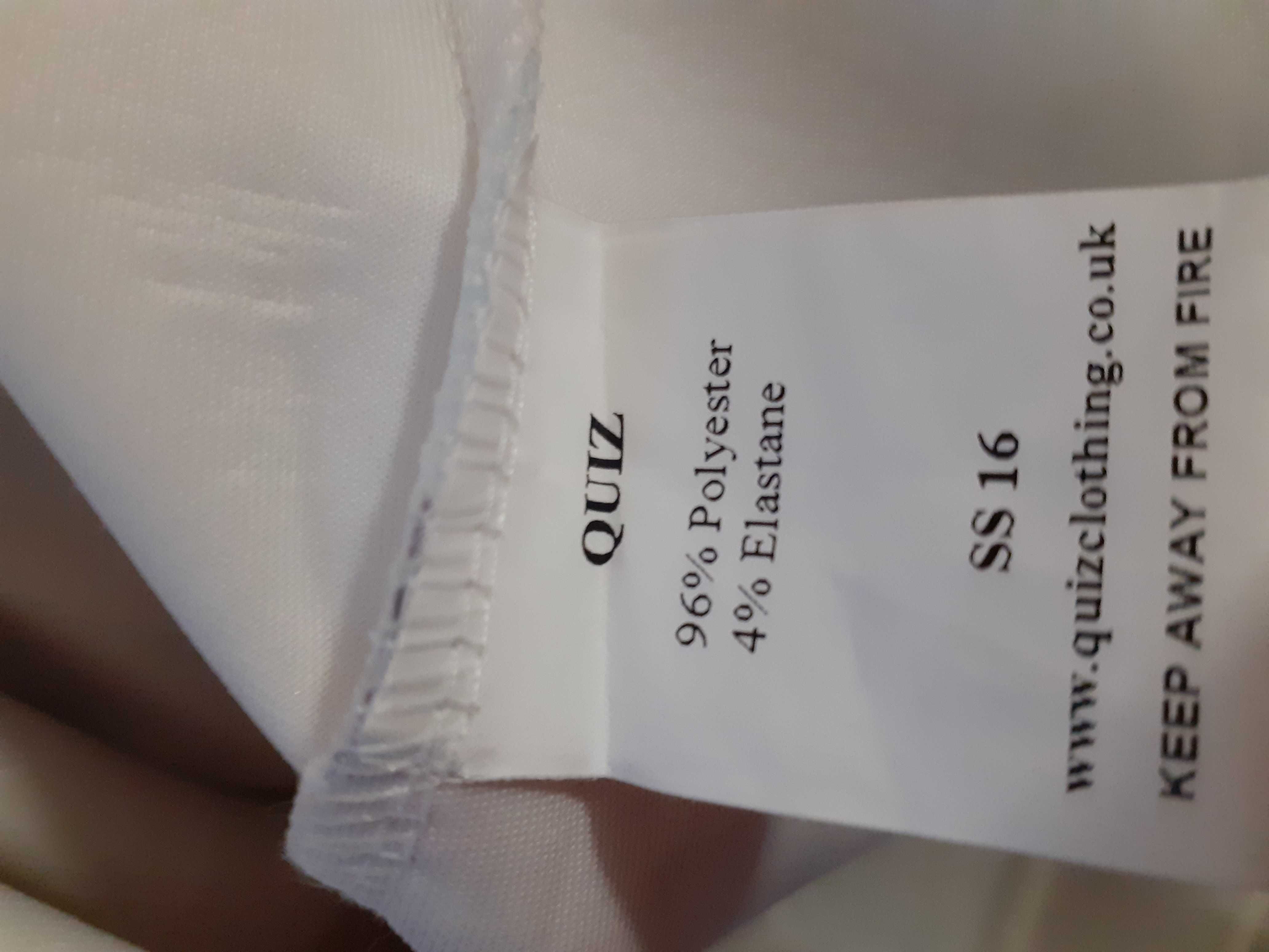 Rochie mulată, conică, cu imprimeu floral și plasă