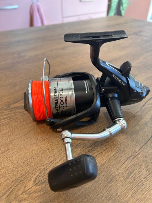 Макара shimano baitrunner 12000 oc
