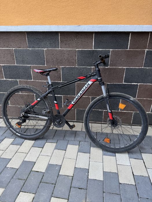 Vând bicicleta ca și nouă