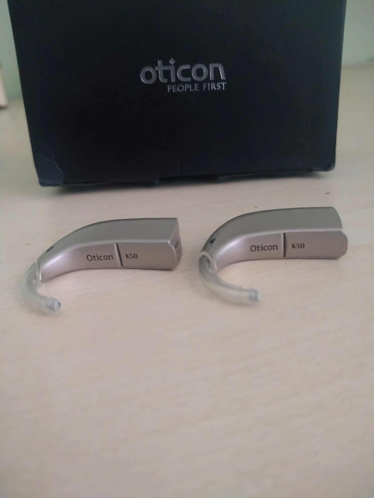 Oticon k 50 слухови апарати
