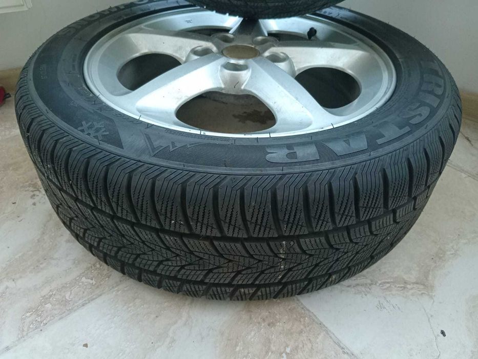 Set cauciucuri de iarna cu genti