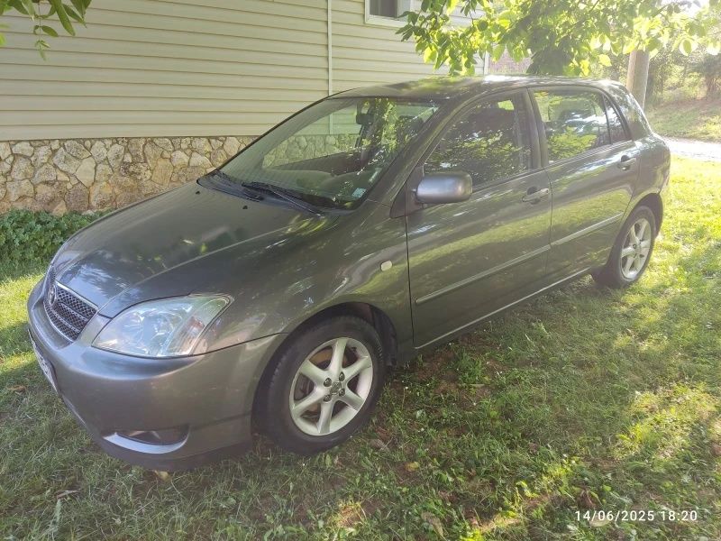 Тойота Corolla 2003