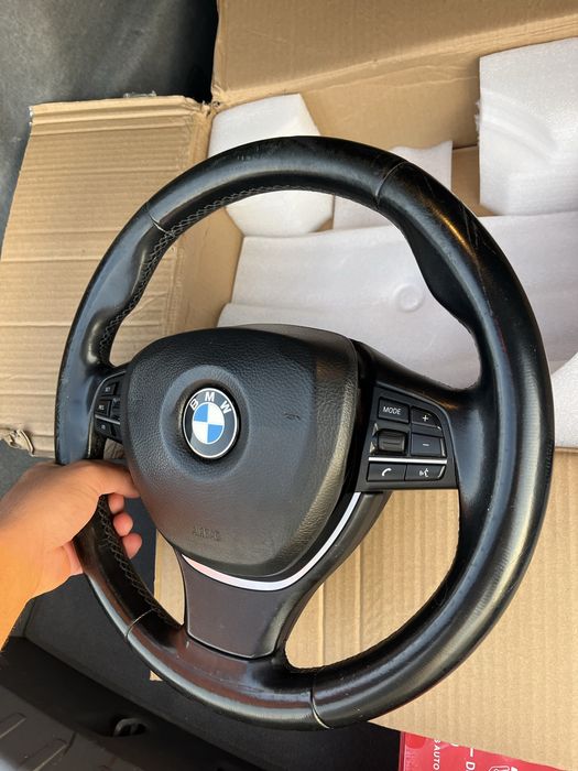 Volan BMW pentru  F în stare bună