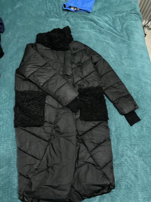 Продам Пуховик в отличном состоянии