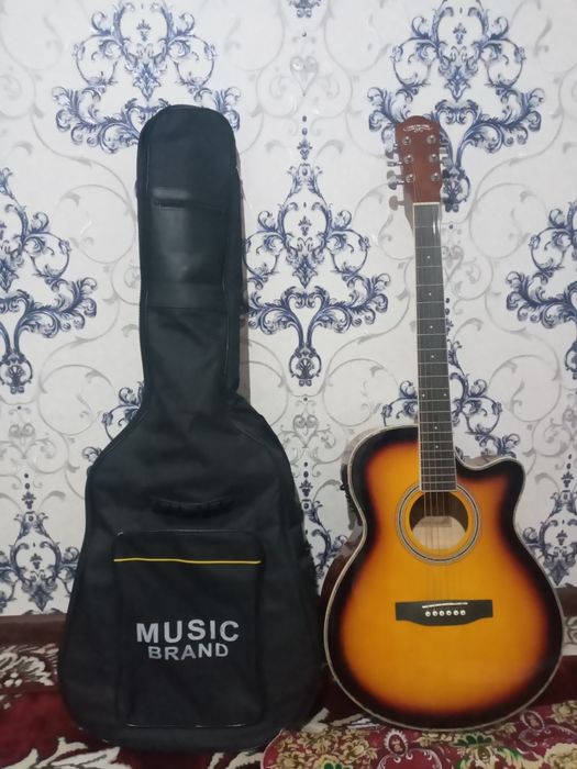 Okustik gitara yangi