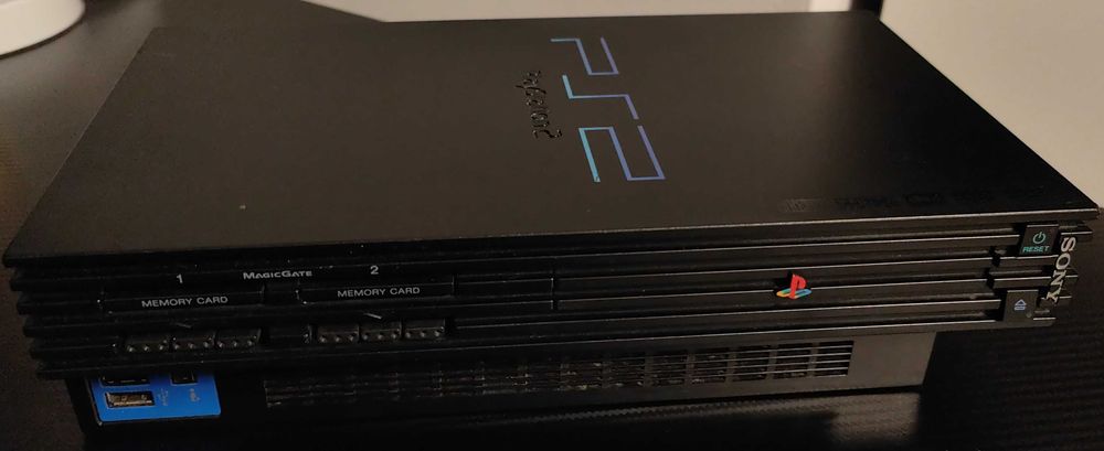 Playstation 2 cu 33 jocuri de top ,maneta ,cabluri