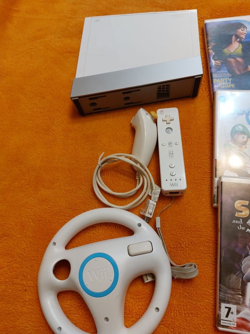 Nintendo Wii - Joc Video cu 8 jocuri și rucsac original