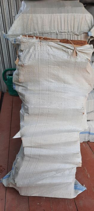 Дрова сухие  в мешках  1500т