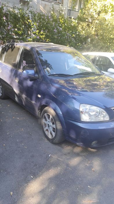 Kia  Carens с газова уредба