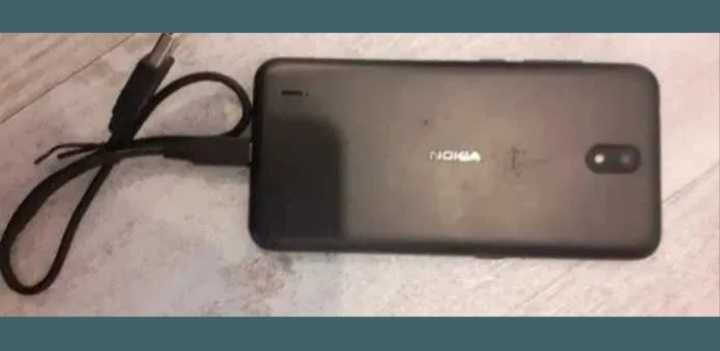 Telefon Nokia C1, ca nou + husa + prinzatoare