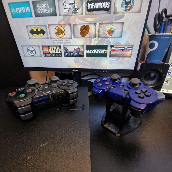 Playstation 3 slim modat Hdd 500gb 2 manete PS3 50 jocuri