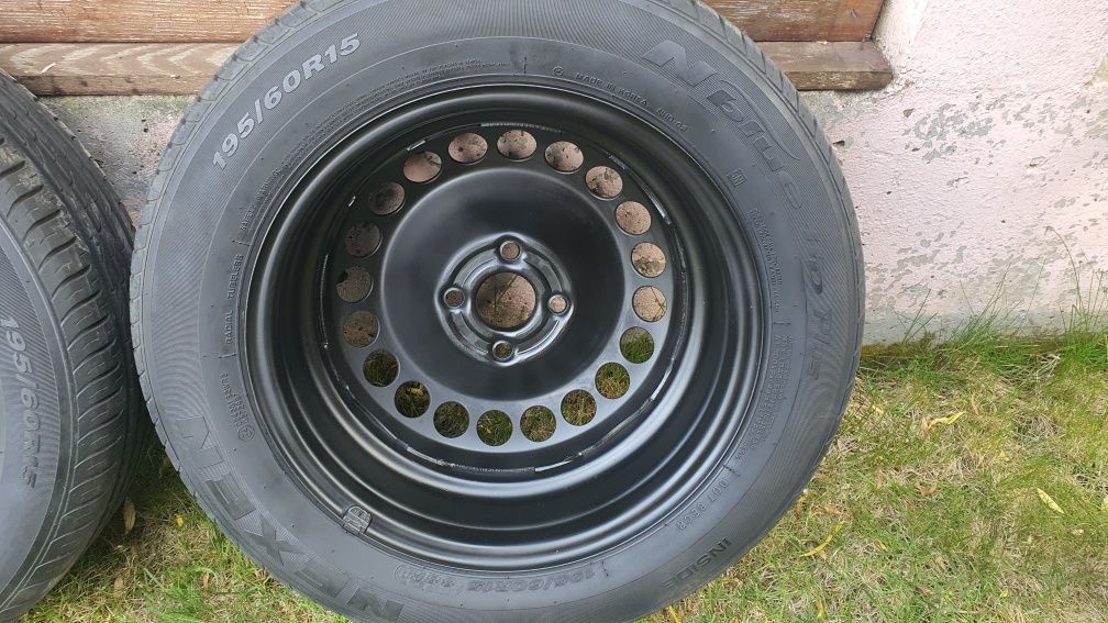 Roti vară Opel Corsa D jante tabla 4x100 anvelope 195/60 R15 Nexen HD