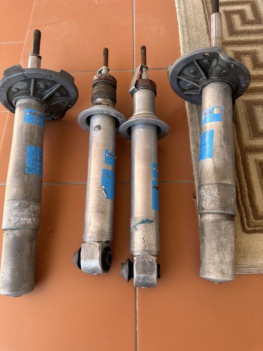 Бмв е65 амортизатор